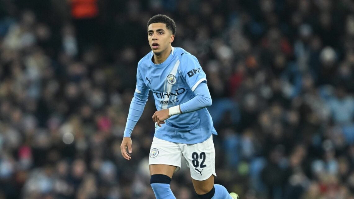 Rico Lewis in action for Man City