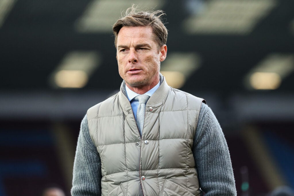Burnley manager Scott Parker looks concerned.