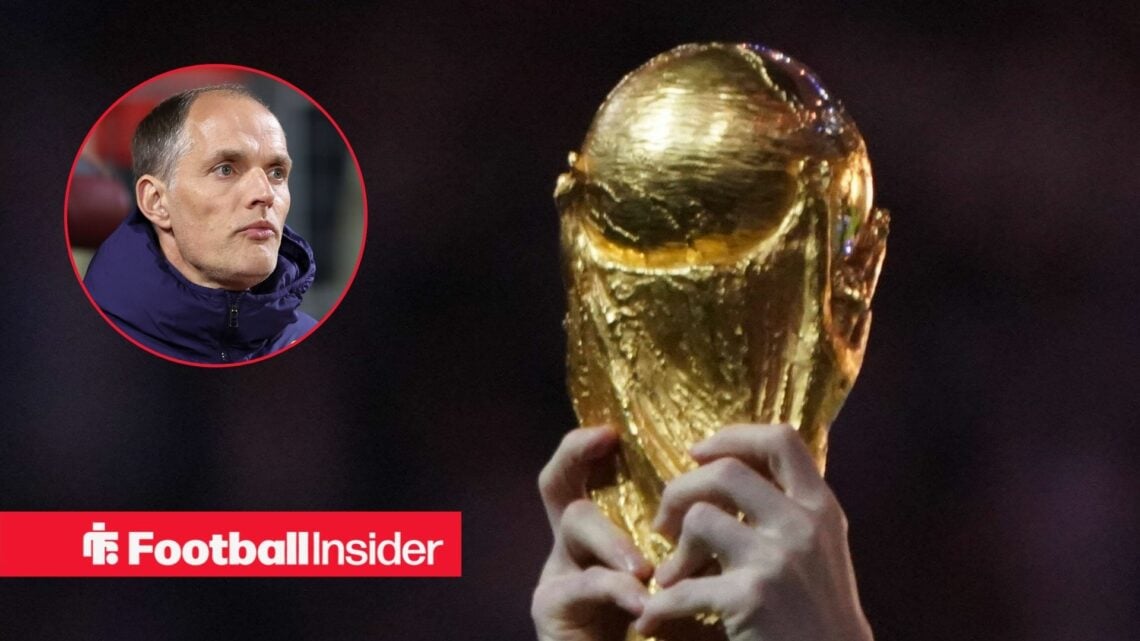 Thomas Tuchel looking at World Cup trophy from circle