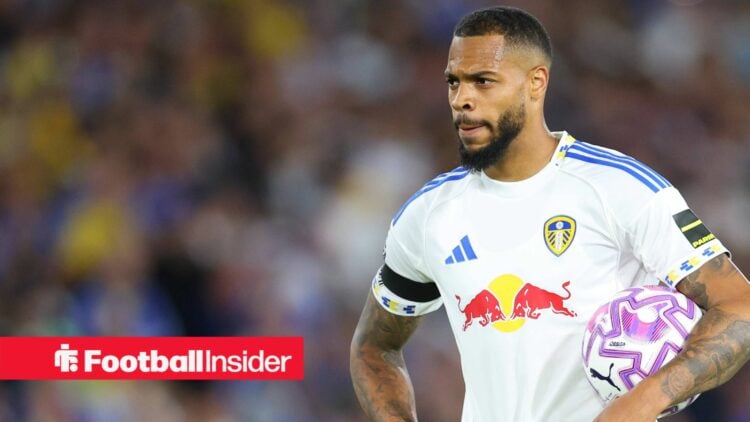 Lukas Nmecha in Leeds kit holding ball