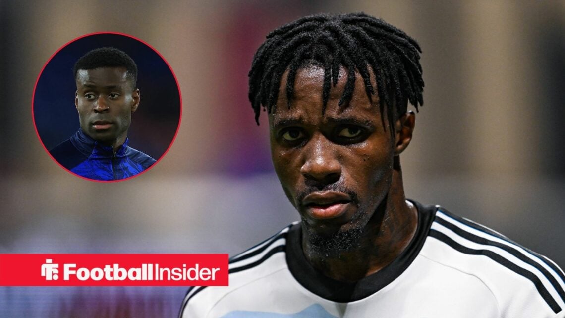 Wilfried Zaha looking at Marc Guehi in circle