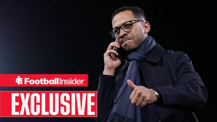 Liam Rosenior on phone with thumb up