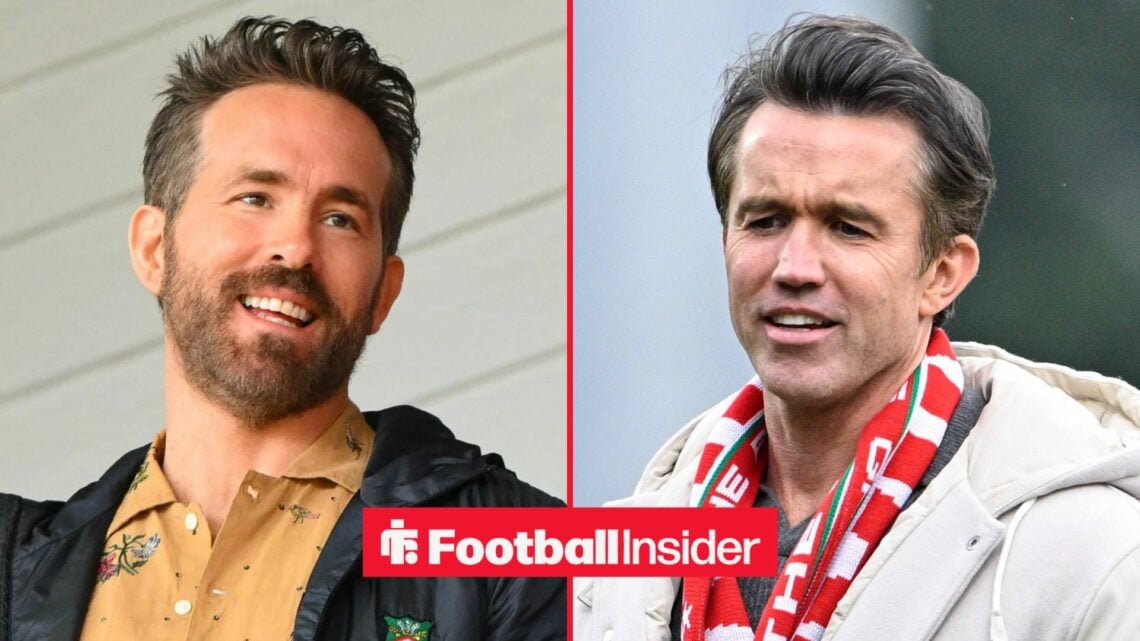 Ryan Reynolds smiling alongside Rob Mac wearing a Wrexham scarf