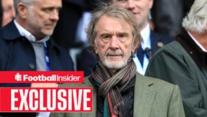 Sir Jim Ratcliffe wearing a green jacket
