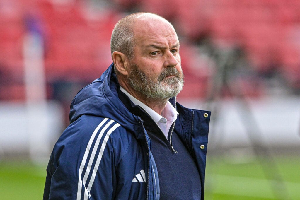 Scotland manager Steve Clarke stands on the touchline during a game.