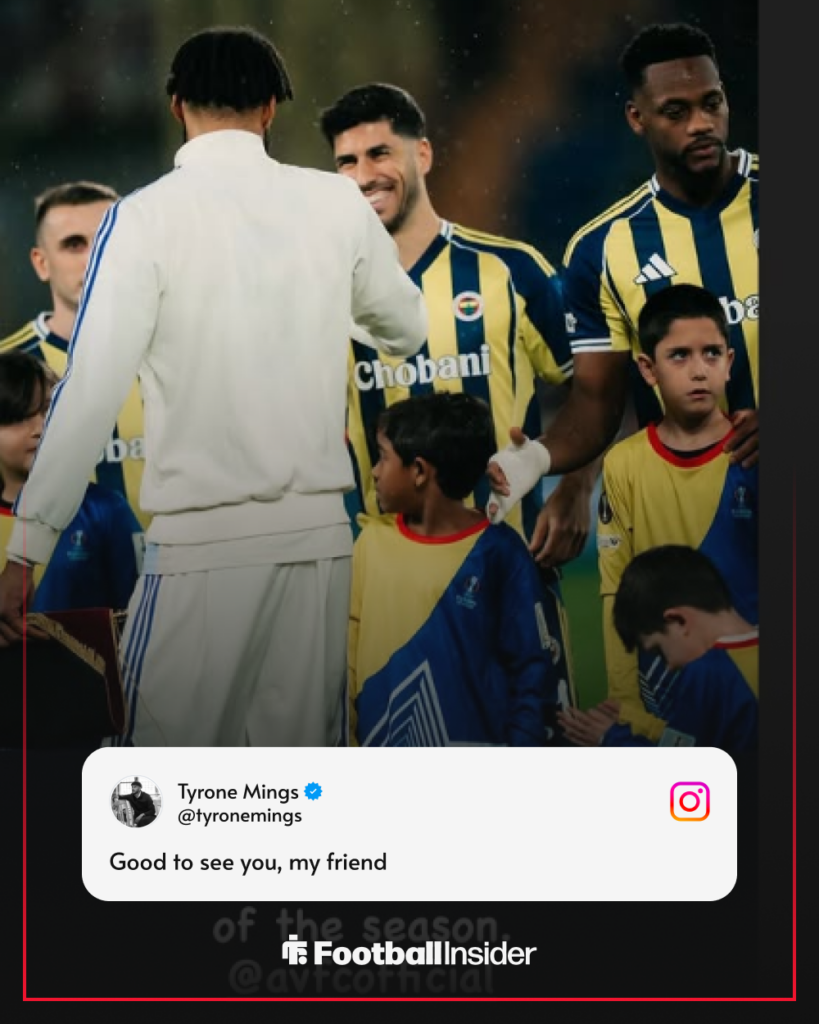 Tyrone Mings shaking hands with Marco Asensio