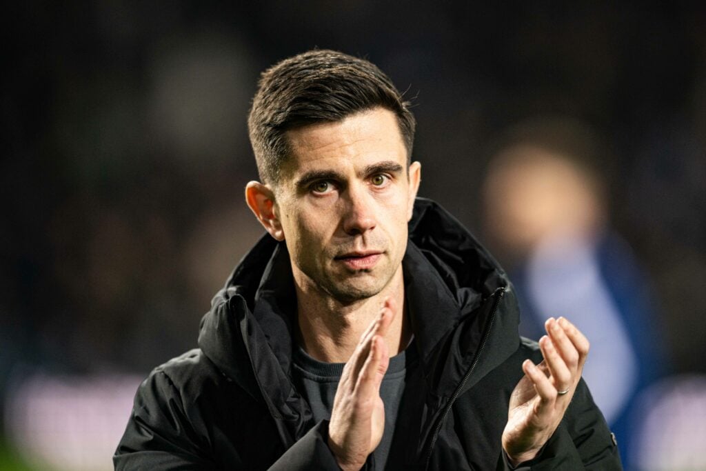 West Brom manager Eric Ramsay claps