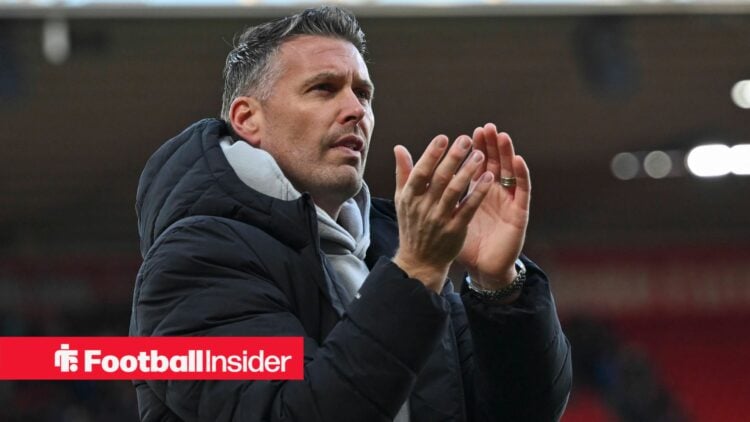 Wolves manager Rob Edwards claps