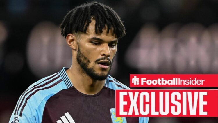 Aston Villa defender Tyrone Mings looks down during a Premier League match