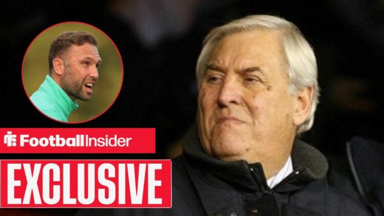 Keith Hackett and John Eustace looking at each other.