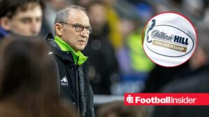 Celtic manager Martin O'Neill stares towards the Scottish Premiership logo, which features in a circular inset.