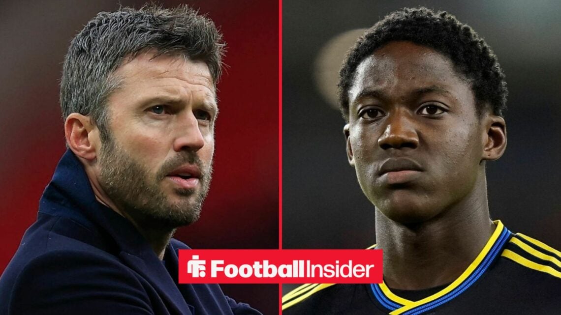 Michael Carrick looking serious alongside Kobbie Mainoo in a Man United shirt