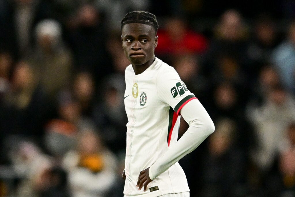 Chelsea striker Tyrique George stands with his hands on his hips during a game.