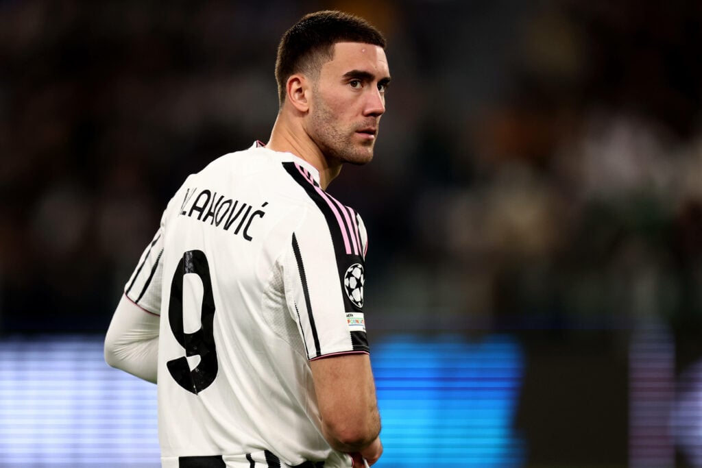 Juventus striker Dusan Vlahovic glances over his shoulder during a game.