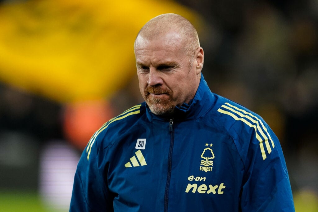 Nottingham Forest manager Sean Dyche stares at the ground.