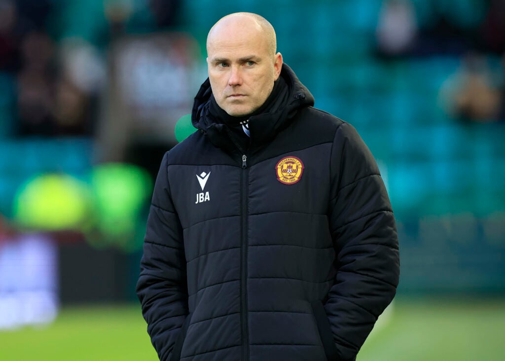 Motherwell manager Jens Berthel Askou stands with his hands in his pockets.