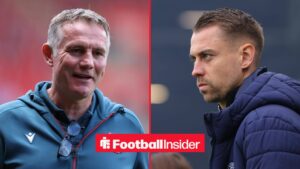 Wrexham manager Phil Parkinson smiles with Southampton manager Tonda Eckert