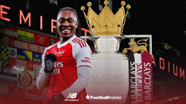 Arsenal midfielder Eberechi Eze celebrates with Premier League trophy behind him
