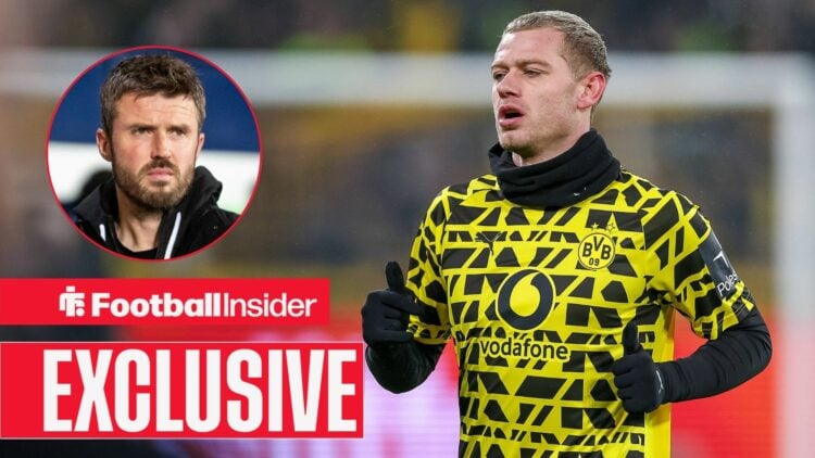 Football Insider exclusive as Julian Ryerson warms up for Borussia Dortmund, while Manchester United manager Michael Carrick watches from a circula...