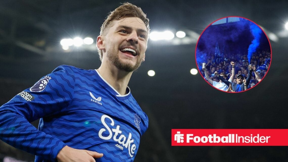 Everton midfielder Kiernan Dewsbury-Hall celebrates a goal, as fans erupt in the stands.