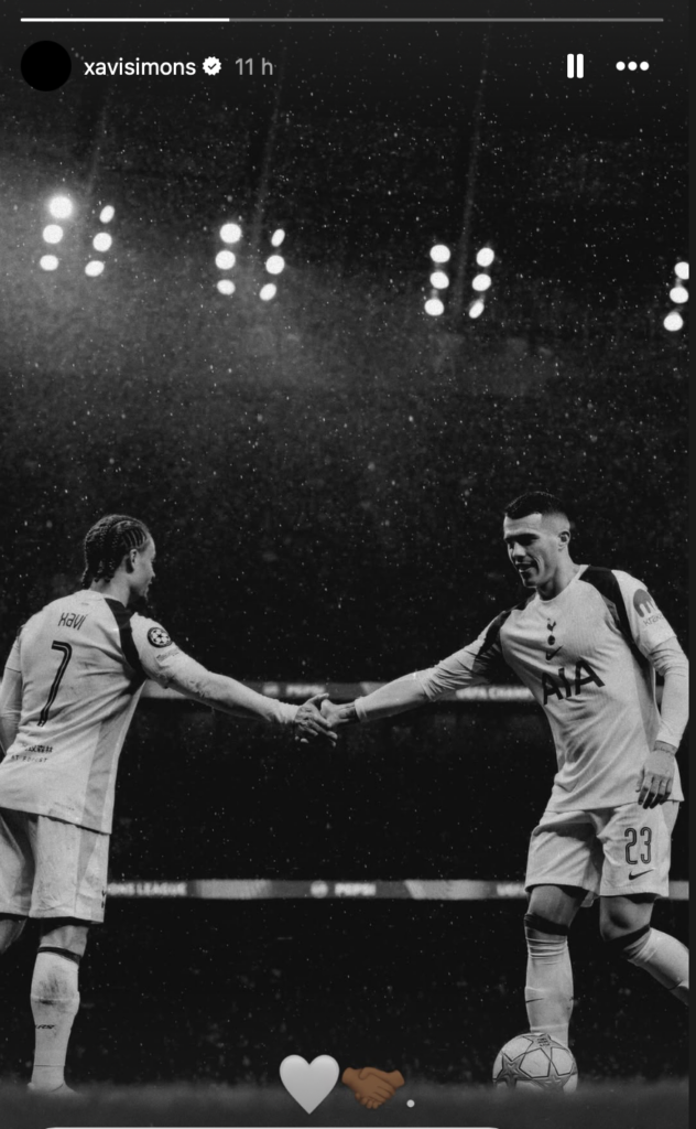 A screenshot of Xavi Simons' Instagram story, showing him shaking hands with Pedro Porro during a substitution.