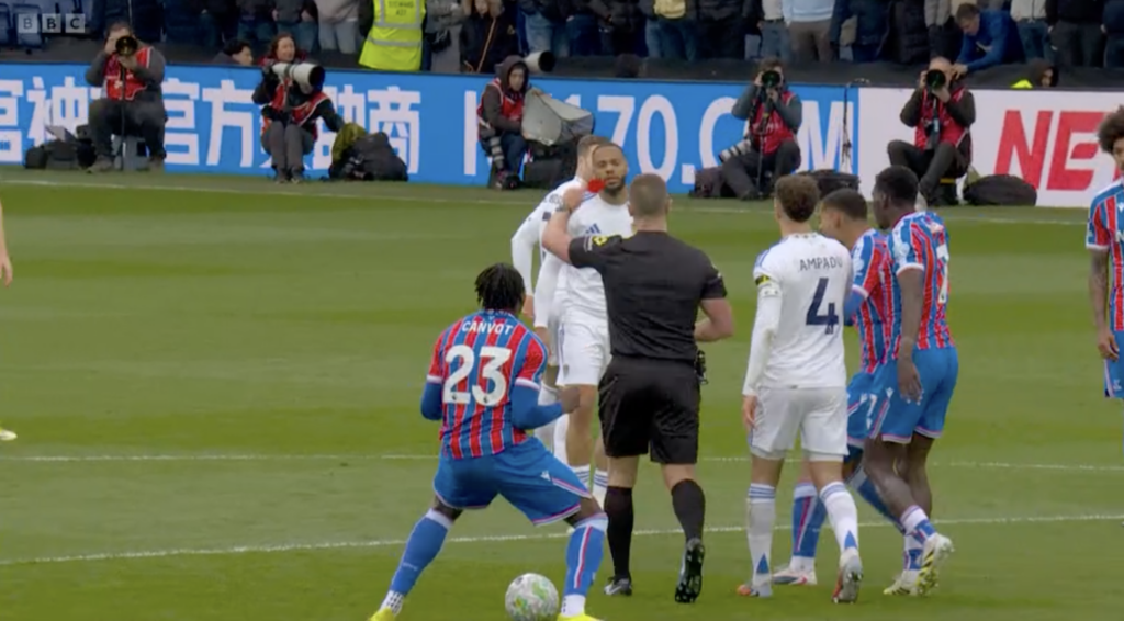 A screenshot from Match of the Day showing Crystal Palace star Jaydee Canvot celebrate a red card.