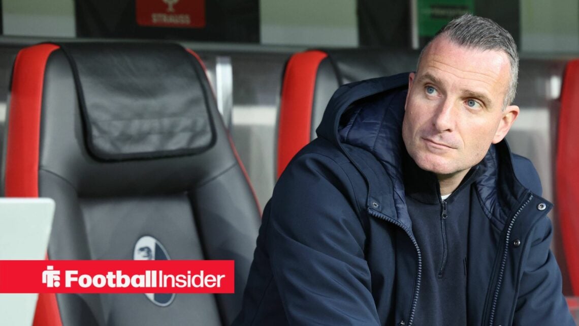 Nicky Hayen sitting in dugout