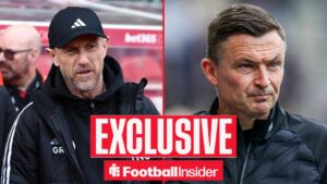 Gary Rowett looking at Paul Heckingbottom on right