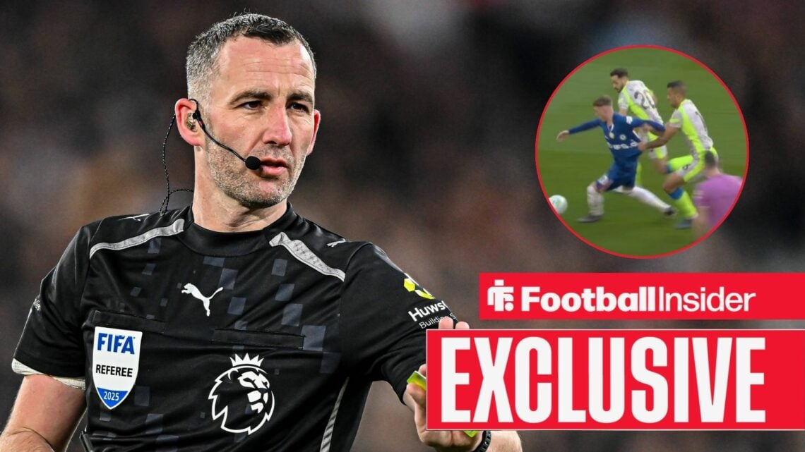 Chris Kavanagh, the match referee, gestures during the Premier League match between West Ham United and Fulham at the London Stadium in Stratford, ...