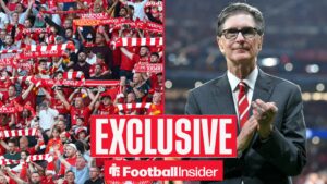 Liverpool fans alongside owner John W Henry