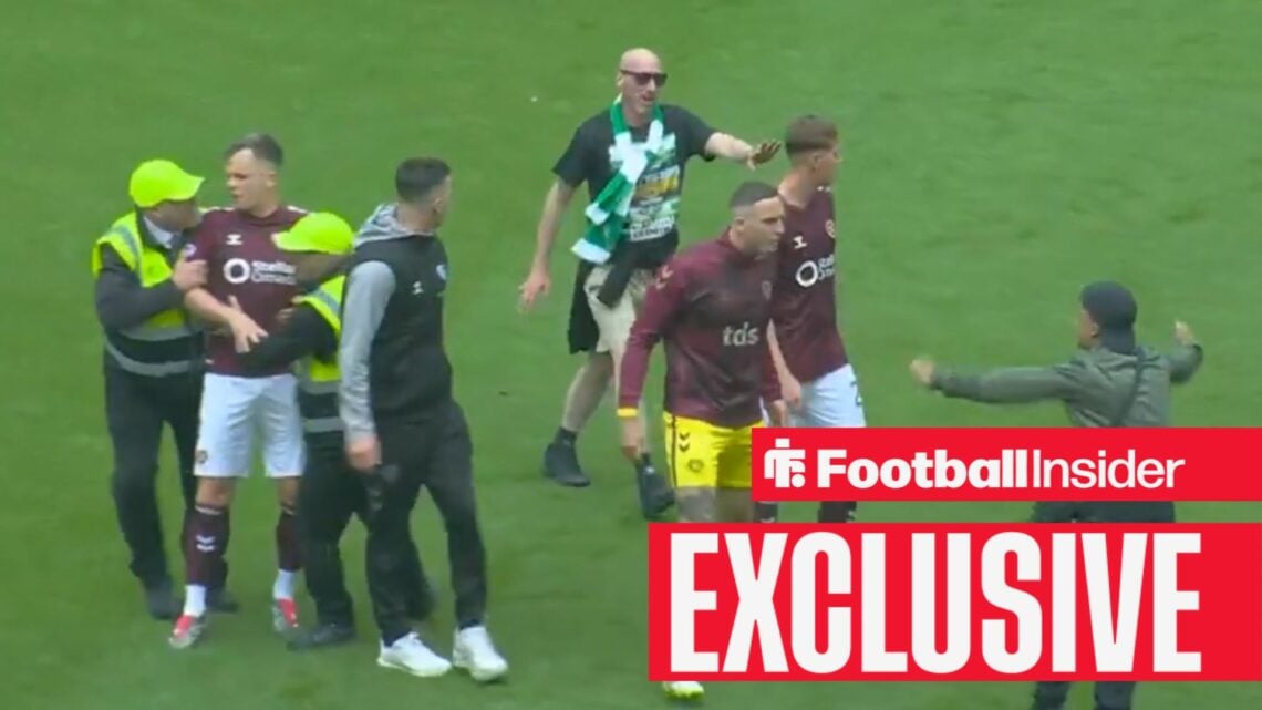 Lawrence Shankland protected by Celtic supporters during Celtic Park pitch invasion on 16 May, 2026