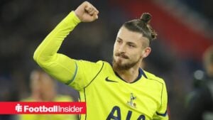 Tottenham defender Radu Dragusin celebrates