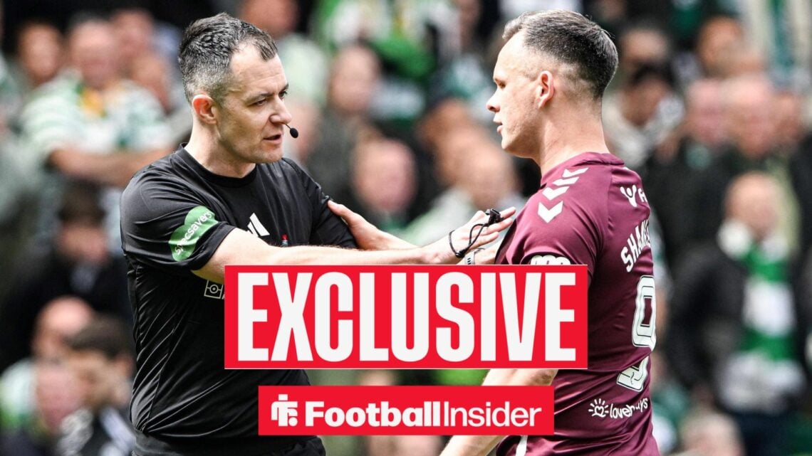 Lawrence Shankland of Heart of Midlothian speaks with the match referee Don Robertson during the William Hill Premiership match at Celtic Park, Gla...