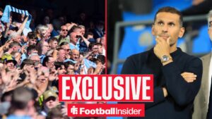Manchester City fans alongside chairman Khaldoon Al Mubarak