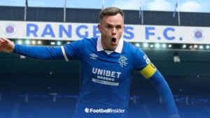 Lawrence Shankland celebrating in a Rangers kit at Ibrox Stadium