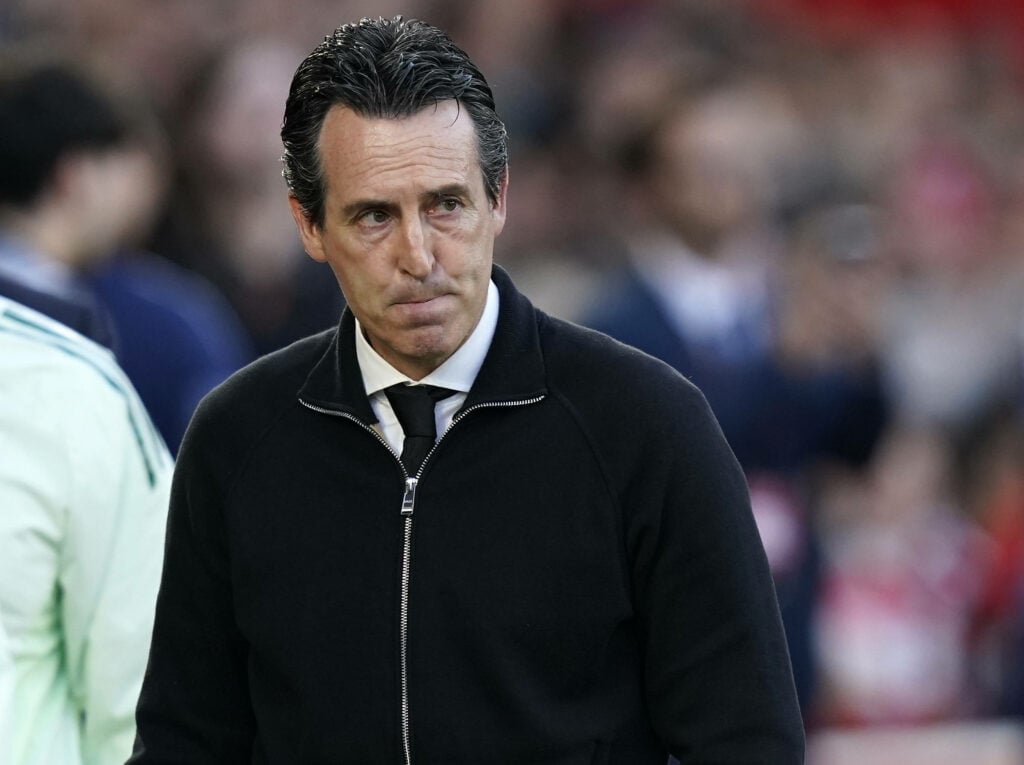 Aston Villa manager Unai Emery stares nervously to the right during a Europa League semi-final against Nottingham Forest.